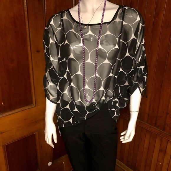 Black and white sheer blouse with peekaboo sleeve - Picture 2 of 6